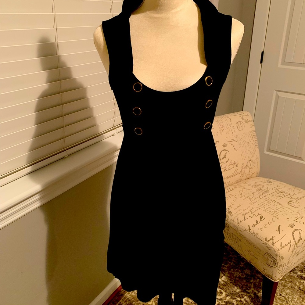 Black sleeveless summer dress, or wear under a jacket.
